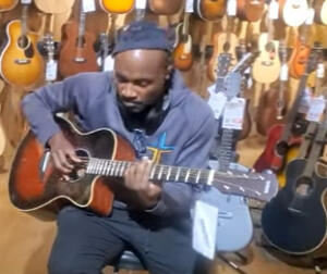 profile photo_2024_at_GuitarCenter_NKENGAFAC Kole-Kole_song-maker_Afrique_Island_Rock
